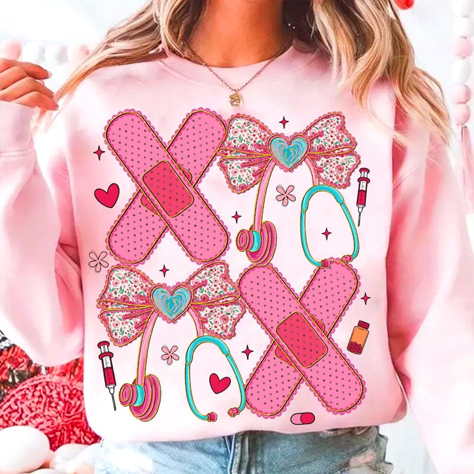 Light Pink Medical XOXO Graphic Sweatshirt with Hearts & Stethoscopes for Cozy Comfort