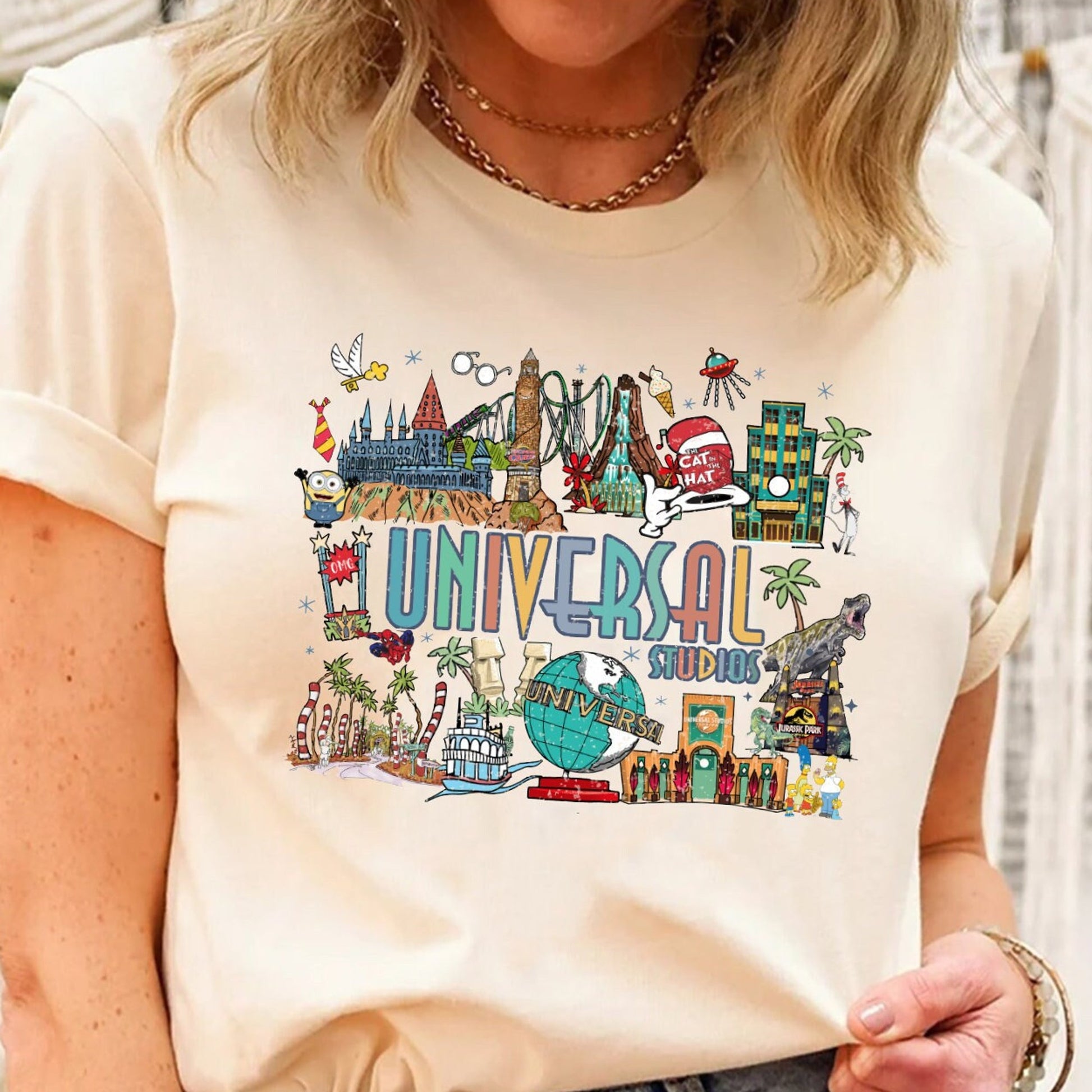 Colorful Theme Park Castle Dinosaur Graphic T-Shirt for Family Vacation Trip