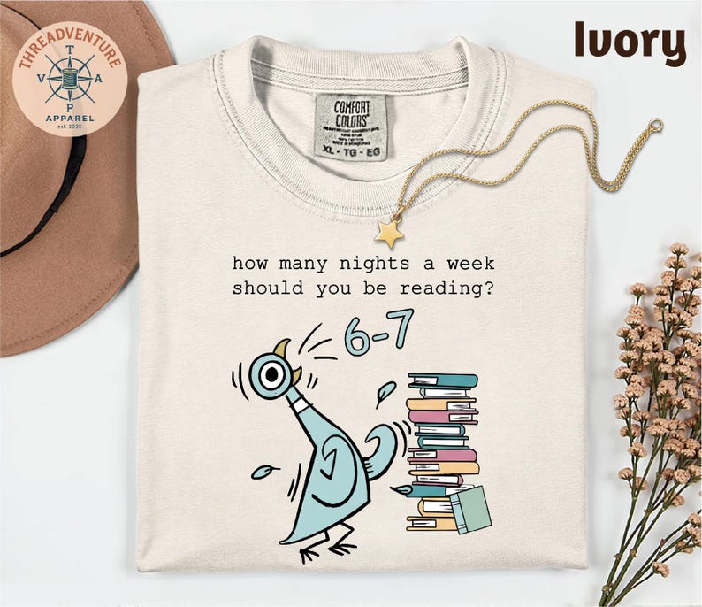 Humorous Pigeon Illustration T-Shirt - "How Many Nights a Week Should You Be Reading?" Light Beige Tee